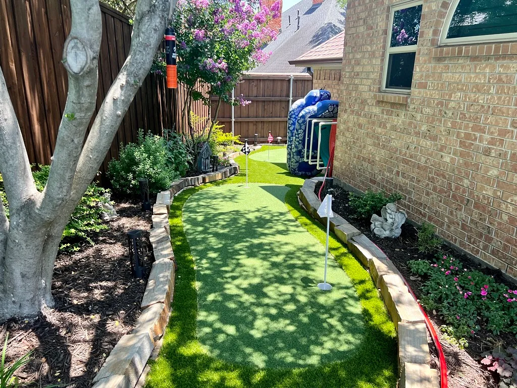 Realistic artificial grass turf made of synthetic fibers installed by Texas Turf Design