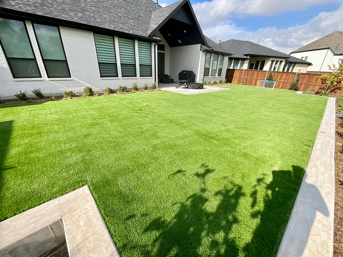 Synthetic turf made of fibers designed to look like natural grass, installed by Texas Turf Design